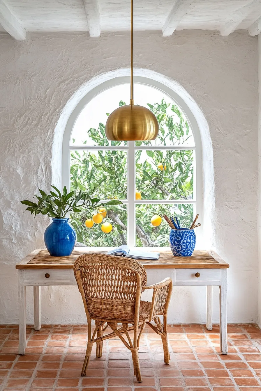 bright coastal home office with pendant lighting mediterranean details and garden views through arched window