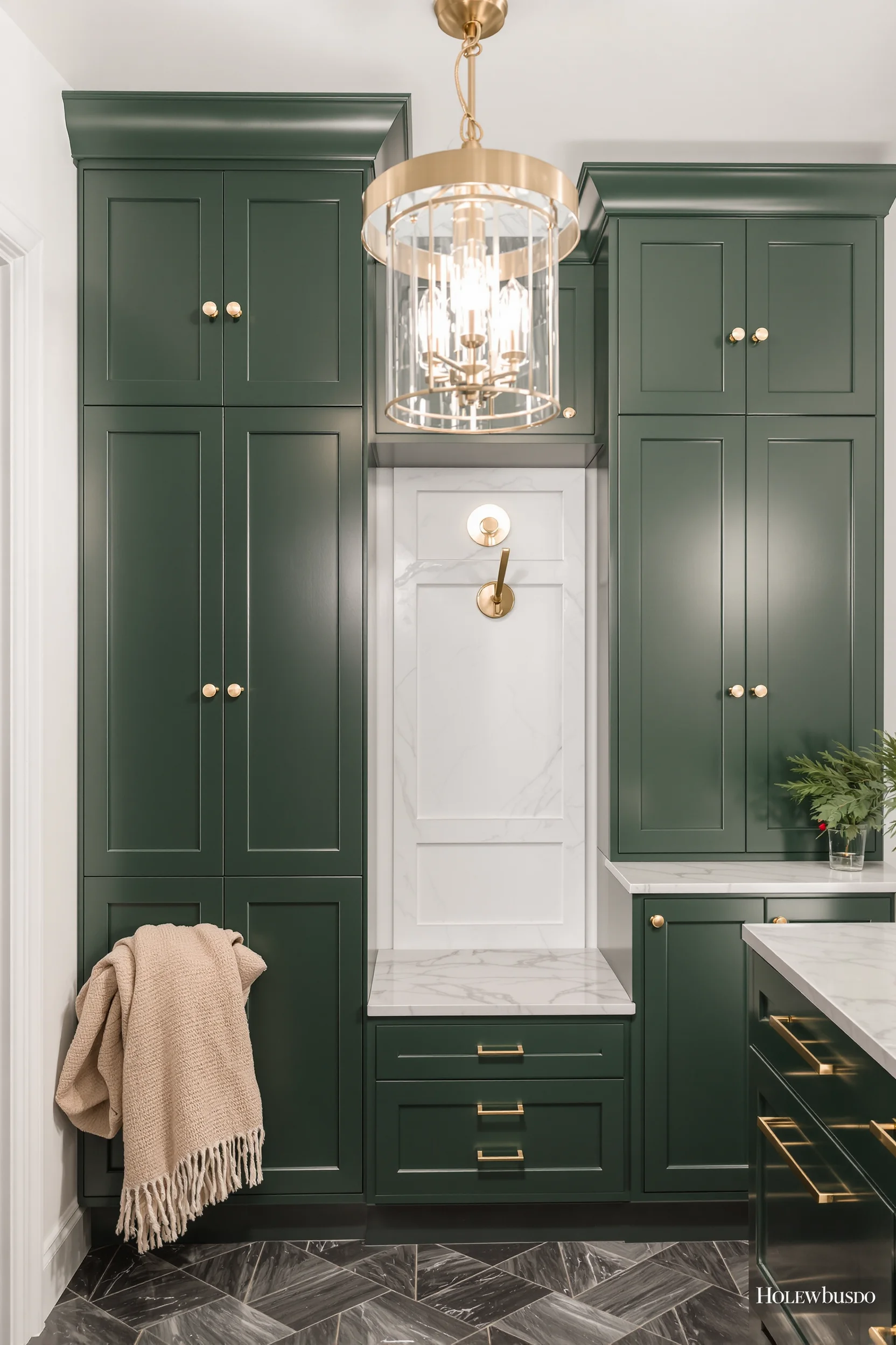 christmas mudroom inspiration displaying white walls with textured bench and professional lighting composition