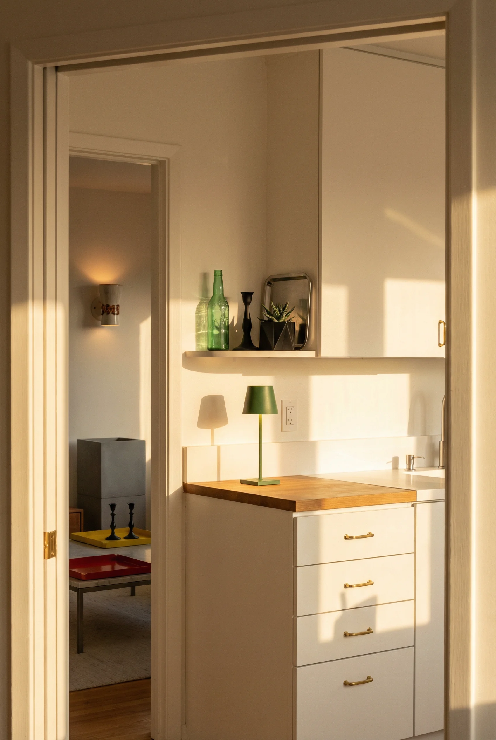 Mid century modern kitchen featuring MCM accent additions transforming white kitchen with green lamp