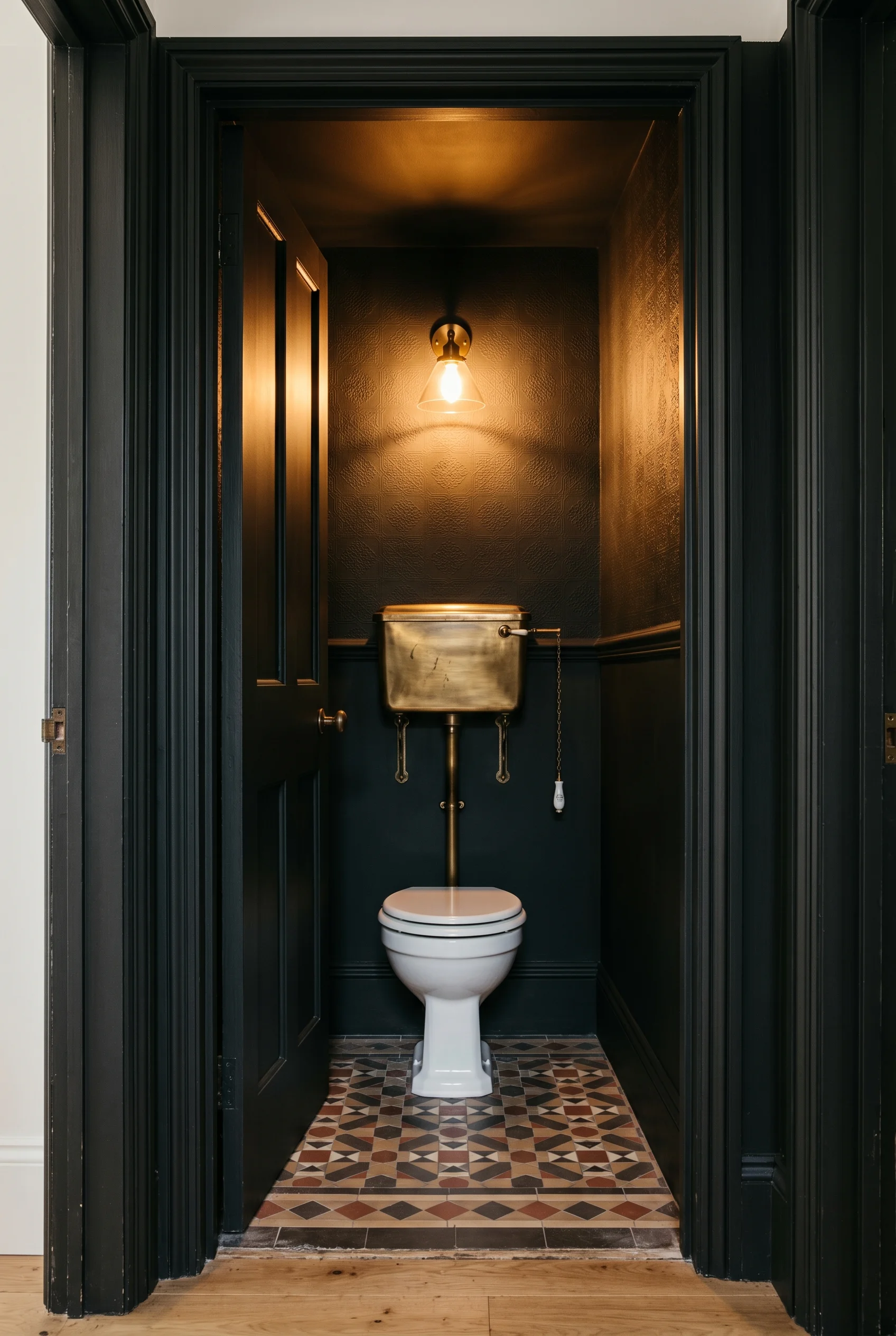 Victorian Bathroom design scene against Off-Black colour-drenched — walls, ceiling, door, and trim all same shade. High-relief Lincrusta paper above d