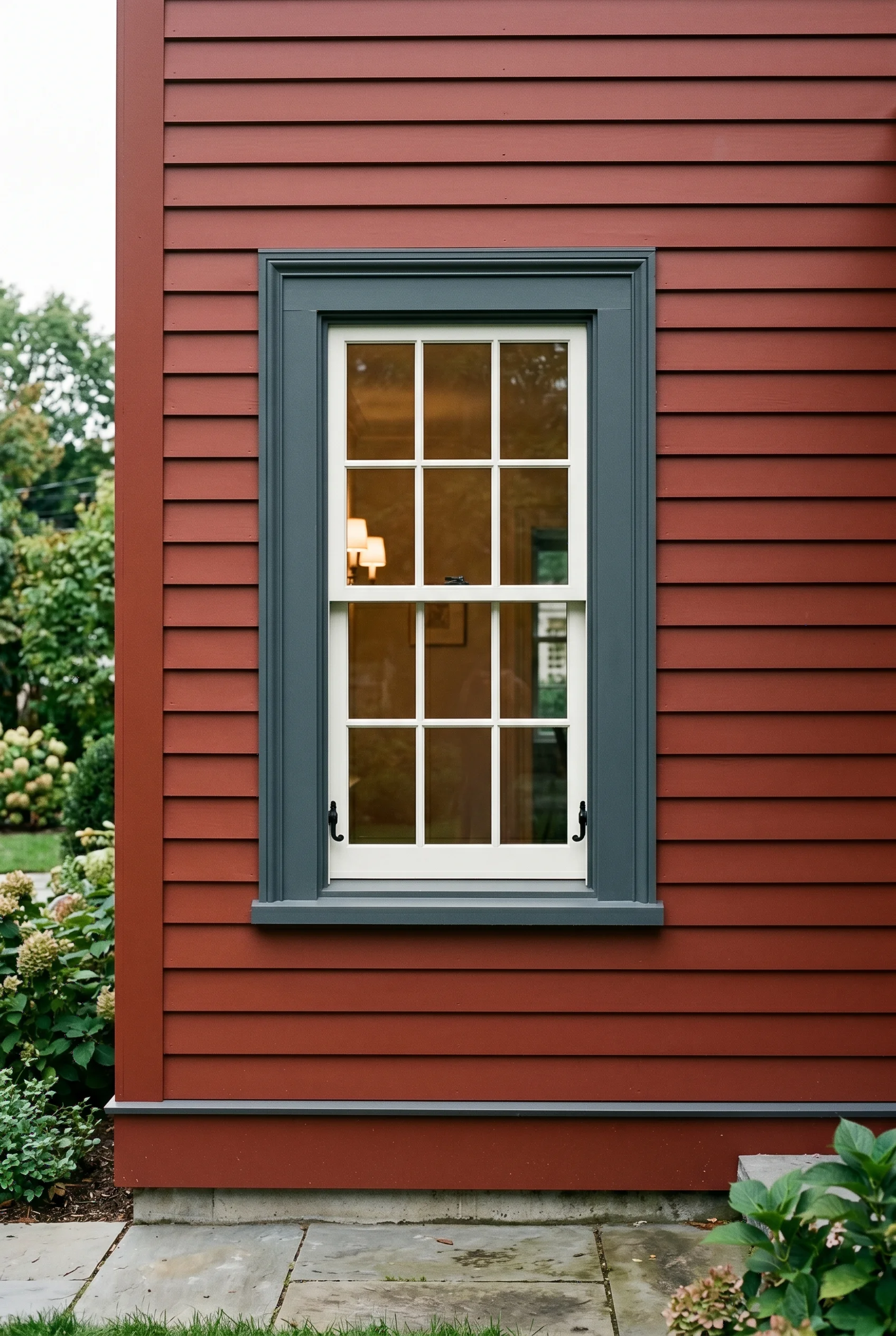 Victorian Exterior design scene against Preference Red deep brick-red painted clapboard siding as the exterior wall surrounding the window walls