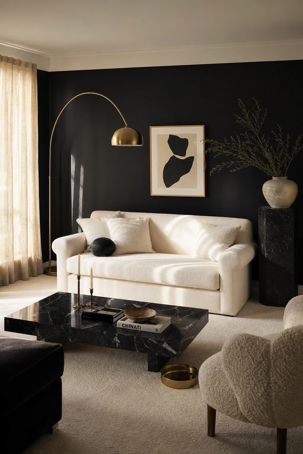 Black and cream interior with cream carpet as the hero, matte black walls, cream upholstered sofa, brass floor lamp, and sheer linen curtains in soft afternoon light