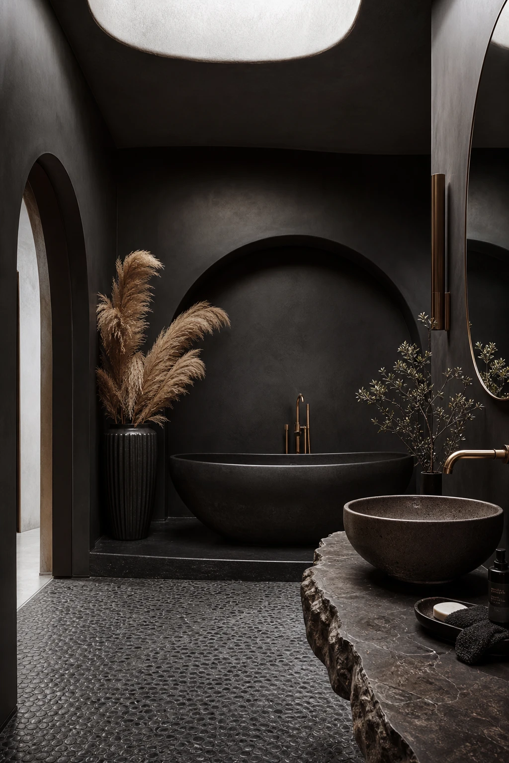 Luxury black bathroom with organic modern forms, curved freestanding tub, sculptural basin, and arched alcove finished in Farrow & Ball Paean Black paint